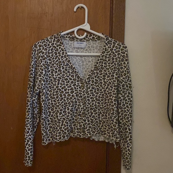 This is a Old Navy sweater. It’s buttoned up and it does button up and down. - Picture 1 of 2